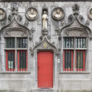 Red Door of the Basilica of the Holy Blood in Burg Square, Bruges, Belgium