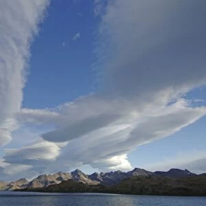 Lenticular cloud formation near. Fortuna Bay, South Georgia. This is a sign of Katabatic Winds approaching
