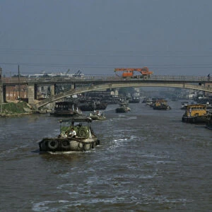 CHINA, Jiangsu Province, Transport Barges travelling down the Grand Canal between