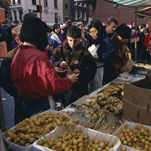 ENGLAND, London, Chinese New Year Food stall during Chinese New Year celebrations in