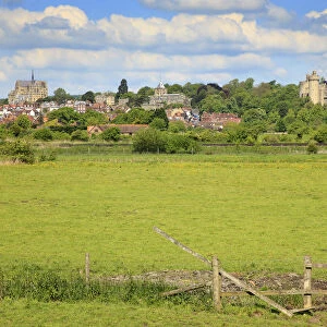 England, West Sussex, Arundel, Castle and Cathedral seen across farmland