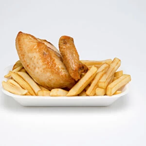 Food, Cooked, Poultry, Fried chicken quarter with potato chips in a polystyrene foam tray