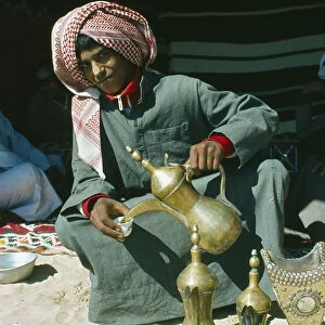 Qatar, General, Bedouin youth pouring coffee