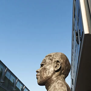 A sculpture of Nelson Mandelas head located outside the Royal Festival Hall