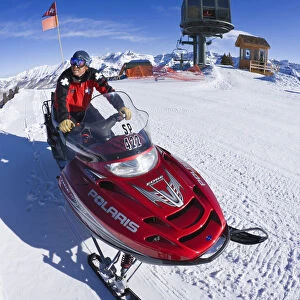 Ski Patrol on Skidoo motorised snow mobile