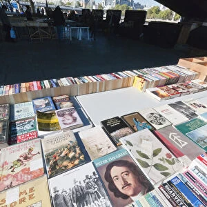 The thriving book market on the South bank under Waterloo bridge in London is open all