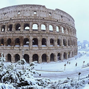 The Colosseum is seen during a heavy snowfall in Rome