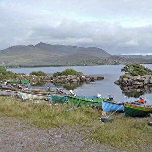Fishing boats moored on shore of freshwater lake, Lough Currane, County Kerry, Southwest Ireland, september