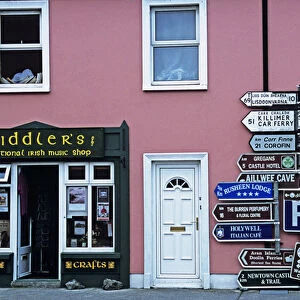 Europe, Ireland, Ballyvaughan. Storefront and direction signs. Credit as: Dennis