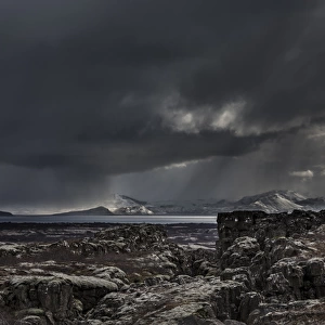 Iceland, Fagrabrekka, Thingvellir National Park. Storm clouds above an otherworldly landscape