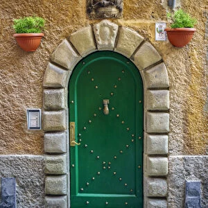 Italy, Porto Venere. Ornate house door. Credit as: Jim Nilsen / Jaynes Gallery / DanitaDelimont
