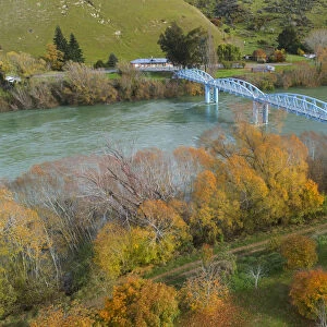 Millers Flat Bridge, Clutha River and autumn trees, Central Otago, South Island