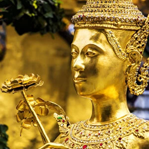 South East Asia; Thialand; Bangkok; Golden Kinnara statue at Emerald Buddha Temple