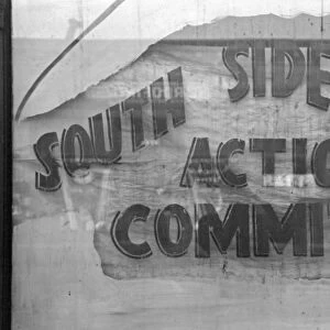 CHICAGO: SOUTH SIDE, 1941. A sign in the window of the South Side Action Committee in Chicago