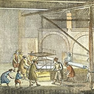 GLASSMAKING, 18th CENTURY. Preparing to hoist the ladle of molten glass and swing it over the casting table for the manufacture of plate glass: line engraving, French, 18th century