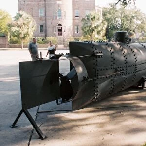 HUNLEY SUBMARINE: REPLICA. Replica of the Confederate submarine Hunley, on display outside the Museum of Charleston, Charleston, South Carolina. Photographed in 2005