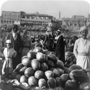 IRAQ: FRUIT MARKET, 1932. Watermelon vendors at a fruit market at Mosul, Iraq, 1932