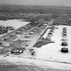 PALESTINE: OIL TANKS, 1937. Oil tanks of the Iraq Petroleum Company in Haifa, Palestine