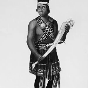 SENECA MAN, 1851. D├ñ-Ah-De-A, a Seneca Native American man in traditional Iroquois dress. Aquatint engraving from Lewis Henry Morgans League of the Iroquois, 1851