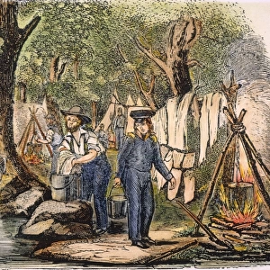 SOLDIERS IN CAMP, 1840s. U. S. Army soldiers washing their clothes in camp. Woodcut