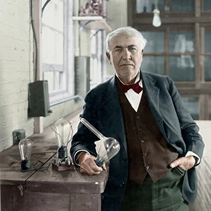 THOMAS EDISON (1847-1931). American inventor. With his Edison Effect lamps in his West Orange
