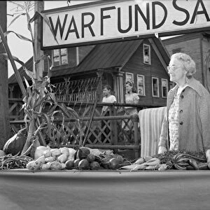 VICTORY STORE, 1942. Mrs. Alice White selling donated produce for the war fund in Hardwick