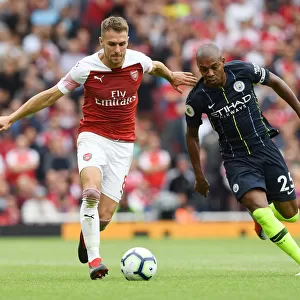 Arsenal's Aaron Ramsey Outmaneuvers Manchester City's Fernandinho in Premier League Showdown