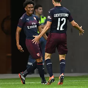 Arsenal's Reiss Nelson and Stephan Lichtsteiner Celebrate Goal Against SS Lazio in Stockholm Pre-Season Friendly, 2018