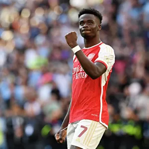 Bukayo Saka's Triumphant Celebration: Arsenal Claim Community Shield Victory over Manchester City