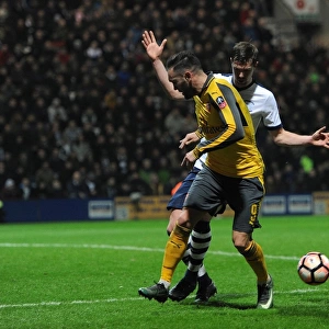 Lucas Perez (Arsenal) back heels the ball for Olivier Guirouds goal under pressure