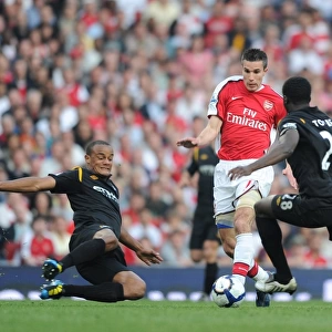 Robin van Persie (Arsenal) Kolo Toure and Vincent Kompany (Man City). Arsenal 0