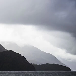 Dark clouds and misty weather in Doubtful Sound, Southland in New Zealand