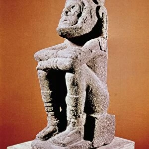 Aztec sculpture of seated male figure. Reissmuseum, Zeughaus, Mannheim