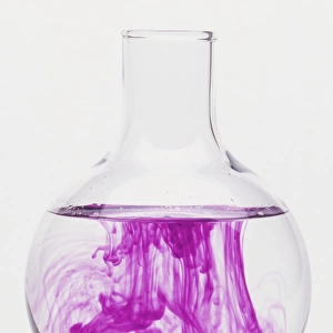 Flask with purple liquid