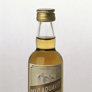 Norway, miniature glass bottle containing Oppland Aquavit
