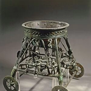 Small four-wheeled bronze chariot with human figures, from Bisenzio (Tuscany region, Italy)