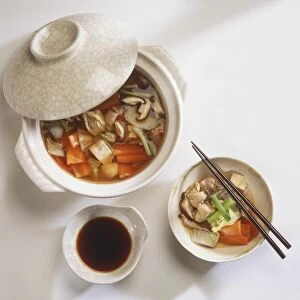 Yosenabe, seafood, chicken and vegetable soup, served in soup bowl and smaller soup dish