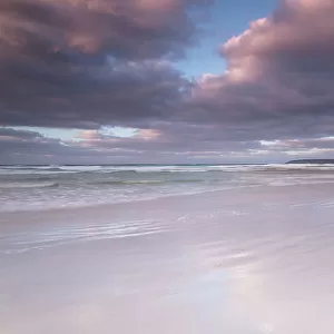 Sunrise over pristine surf beach