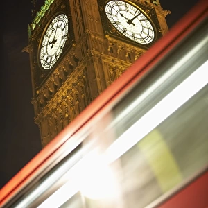 Double Decker Bus Speeding Past Big Ben, London, England