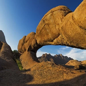 The Eye of Spitzkoppe, the famous Natural Rock Bridge / Arch at Spitzkoppe in the Erongo Region, Namibia, Africa