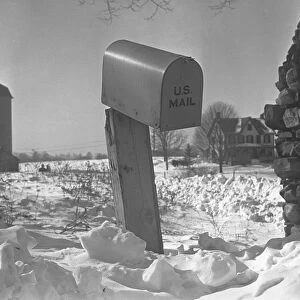 US mailbox at country road in snow, (B&W)