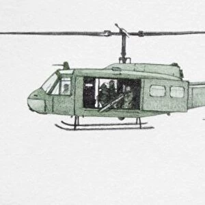 Military helicopter with open door carrying crew, side view
