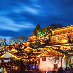 Night view of traditional Chinese wooden building in the Old Town of Lijiang, Yunnan province, China. The Old Town of Lijiang is a popular tourist destination of Asia