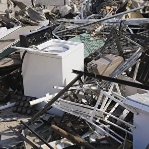 Pile of discarded household and industrial items at a scrap metal recycling centre, Quebec, Canada