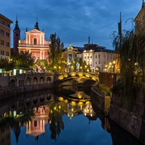 Slovenia, Ljubljana, Illuminated buildings and Ljubljanica River