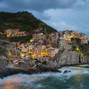 View of the town at dusk, Manarola, Cinque Terre, Liguria, Italy