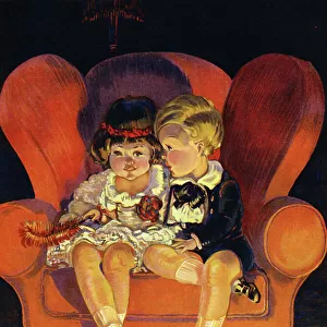 Boy and Girl sitting in armchair 1923