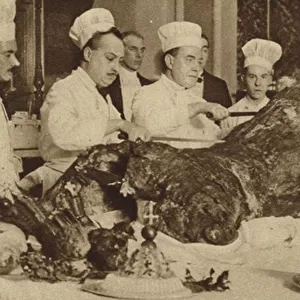 Chefs carving the baron of beef for the annual banquet given at the Guildhall by the new Lord Mayor and Sheriffs of London (b / w photo)