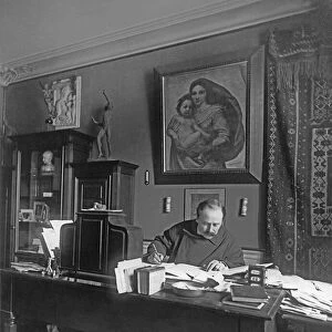 French composer Jules Massenet sitting at his desk (b / w photo)