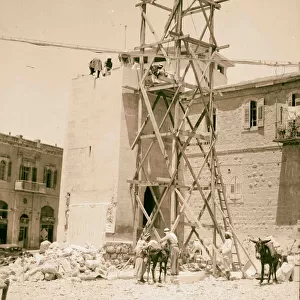 Taking down clock tower Old P. O square 1936 Jerusalem